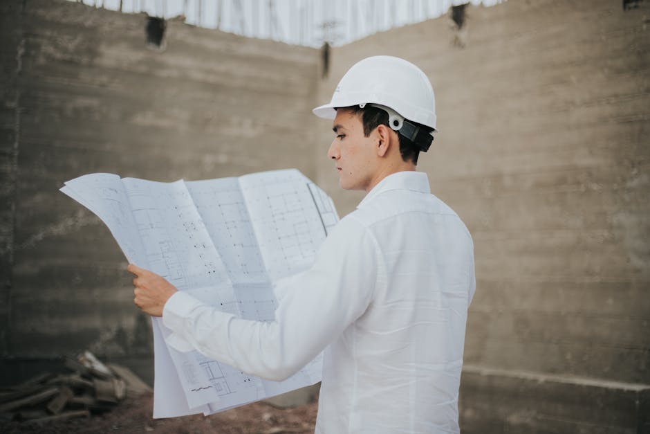 General contractor reviewing blueprints for a home addition